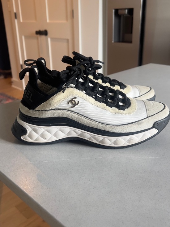 CHANEL Shoes - CHANEL Black and White Quilted-Trim Leather & Mesh Sneakers